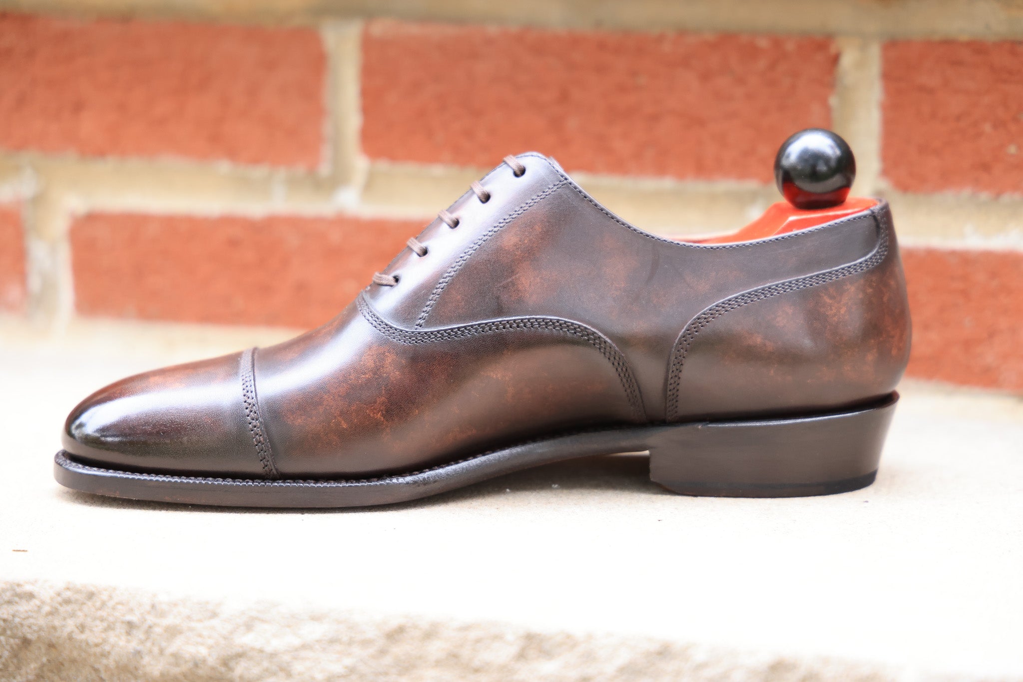 Magnolia - Dark Brown Marble Patina